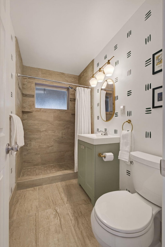 2476 S Florida Mango Rd, West Palm Beach, FL 33406 - full bathroom with toilet, vanity, and a tile shower