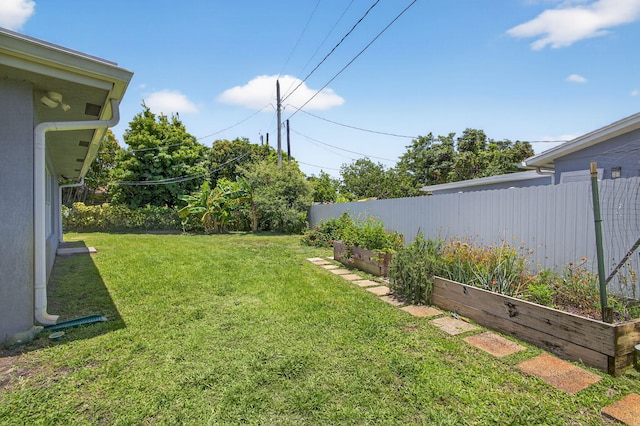 2476 S Florida Mango Rd, West Palm Beach, FL 33406 - view of yard featuring a vegetable garden