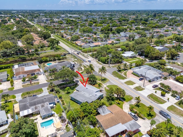 2476 S Florida Mango Rd, West Palm Beach, FL 33406 - aerial view of property and surrounding area with a pool and nearby suburban area