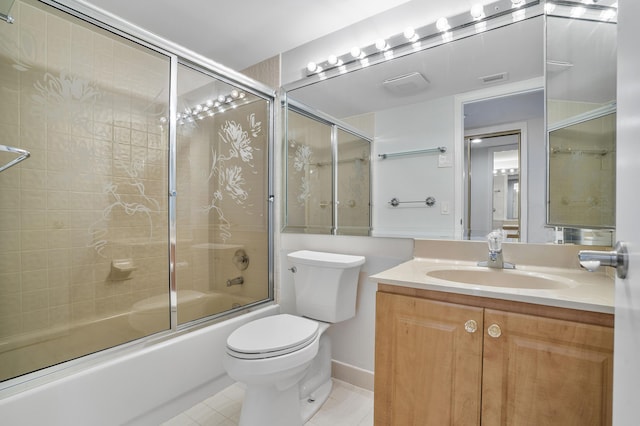 1401 S Ocean Blvd Unit 305, Boca Raton, FL 33432 - full bath with tile patterned flooring, combined bath / shower with glass door, toilet, and vanity