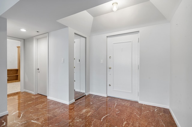 1401 S Ocean Blvd Unit 305, Boca Raton, FL 33432 - foyer with marble finish floors, baseboards, and recessed lighting
