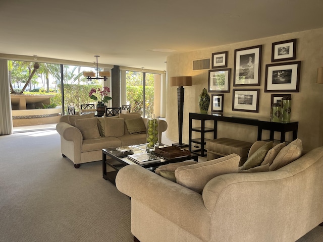 1401 S Ocean Blvd Unit 305, Boca Raton, FL 33432 - living area with a chandelier and carpet