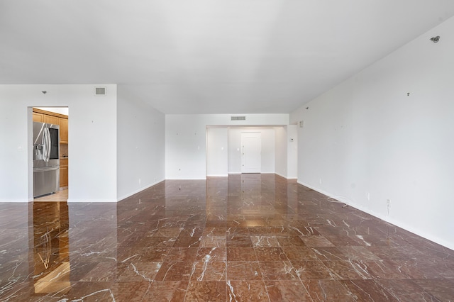 1401 S Ocean Blvd Unit 305, Boca Raton, FL 33432 - unfurnished room featuring marble tiled floors and baseboards