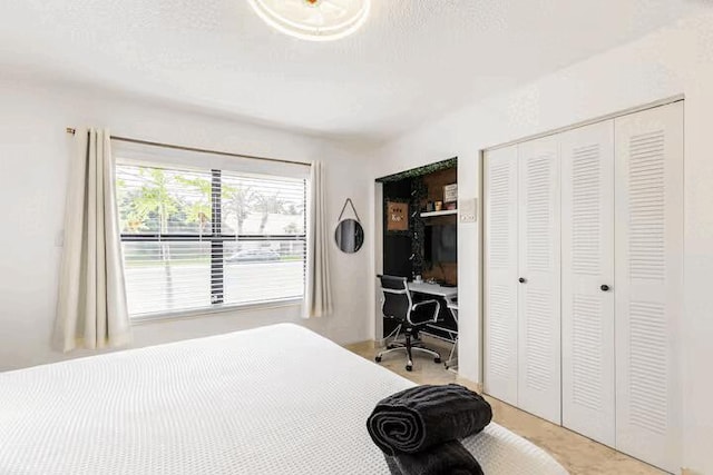 9823 NE Sun Pointe Dr, Boynton Beach, FL 33437 - bedroom with a desk and a closet