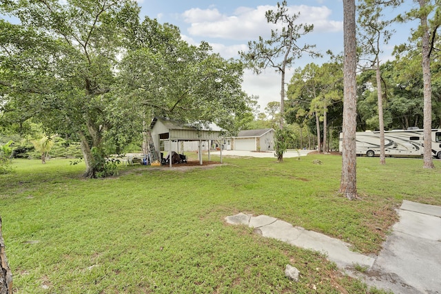 13655 N 68th St N, West Palm Beach, FL 33412 - view of green lawn featuring a garage