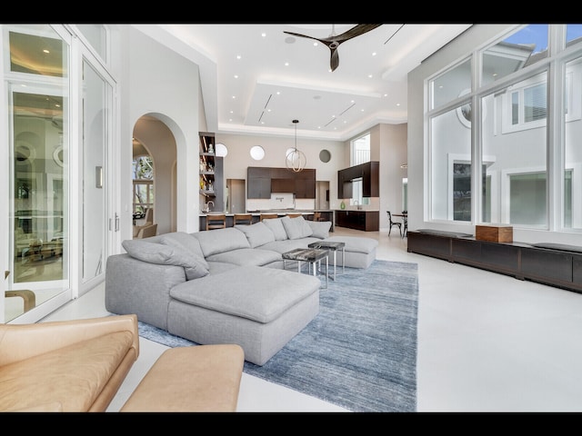 12990 Marsh Lndg, Palm Beach Gardens, FL 33418 - living room with arched walkways, recessed lighting, and ceiling fan