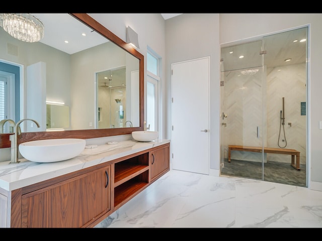 12990 Marsh Lndg, Palm Beach Gardens, FL 33418 - full bath with a marble finish shower, double vanity, a chandelier, recessed lighting, and marble finish floors