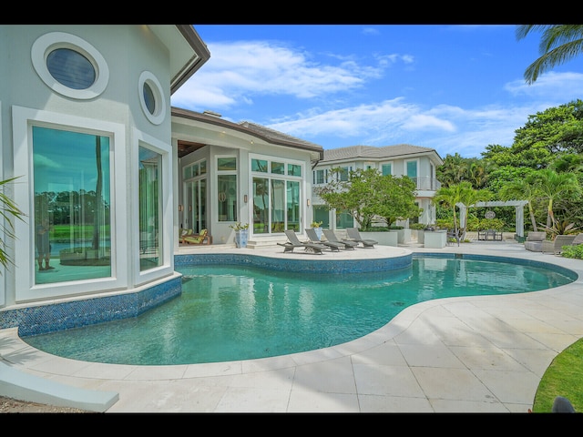 12990 Marsh Lndg, Palm Beach Gardens, FL 33418 - outdoor pool featuring a patio