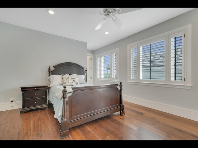 12990 Marsh Lndg, Palm Beach Gardens, FL 33418 - bedroom with wood finished floors, recessed lighting, and a ceiling fan