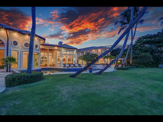 12990 Marsh Lndg, Palm Beach Gardens, FL 33418 - view of play area featuring a yard and an outdoor pool