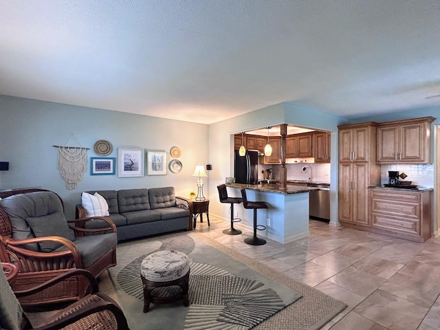 620 Horizons W Unit 105, Boynton Beach, FL 33435 - living room featuring light marble finish flooring