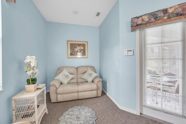 3592 SW Rosser Blvd, Port Saint Lucie, FL 34953 - living area with carpet, healthy amount of natural light, and baseboards