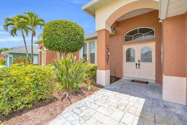 3592 SW Rosser Blvd, Port Saint Lucie, FL 34953 - property entrance featuring stucco siding