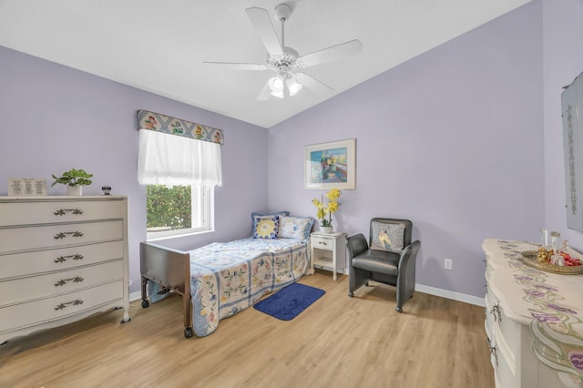 3592 SW Rosser Blvd, Port Saint Lucie, FL 34953 - bedroom featuring light wood-style flooring, vaulted ceiling, baseboards, and a ceiling fan