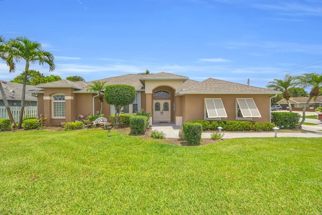 3592 SW Rosser Blvd, Port Saint Lucie, FL 34953 - mediterranean / spanish house featuring stucco siding