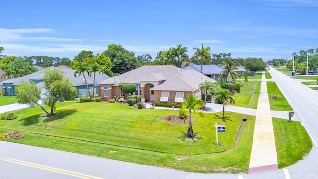 3592 SW Rosser Blvd, Port Saint Lucie, FL 34953 - single story home with a front lawn