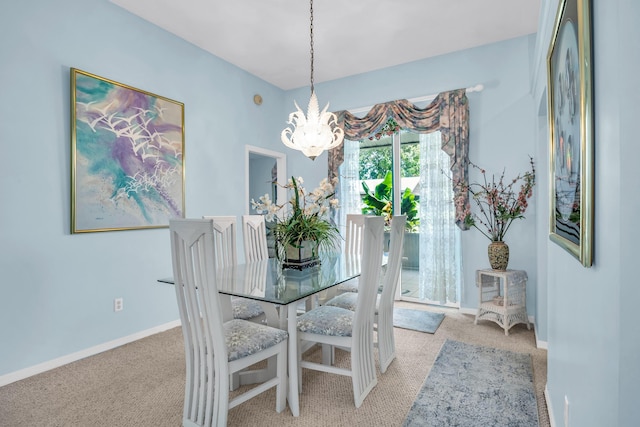 3592 SW Rosser Blvd, Port Saint Lucie, FL 34953 - carpeted dining room with a chandelier and baseboards