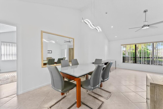 3099 NW 28th Ter, Boca Raton, FL 33434 - dining space with ceiling fan, light tile patterned flooring, high vaulted ceiling, baseboards, and recessed lighting