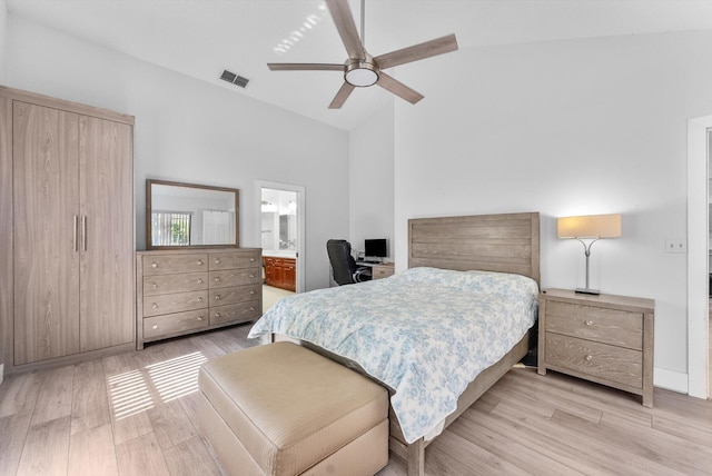 3099 NW 28th Ter, Boca Raton, FL 33434 - bedroom featuring light wood-style flooring, an office area, a ceiling fan, ensuite bath, and high vaulted ceiling
