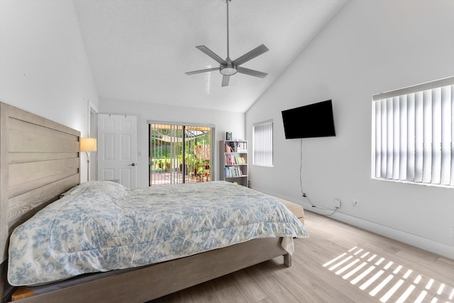 3099 NW 28th Ter, Boca Raton, FL 33434 - bedroom featuring access to exterior, high vaulted ceiling, light wood-style floors, baseboards, and ceiling fan