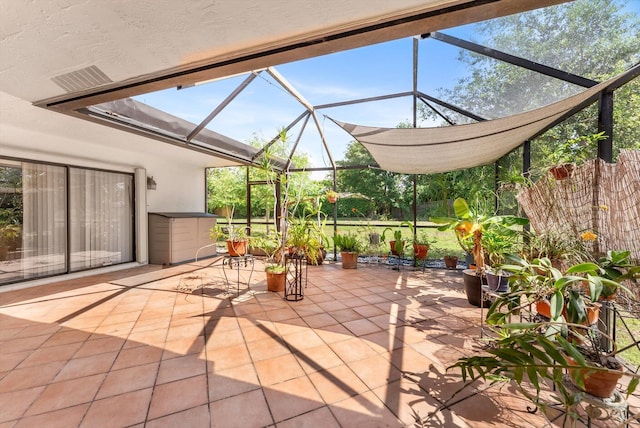 3099 NW 28th Ter, Boca Raton, FL 33434 - view of patio with a lanai
