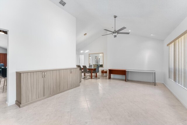 3099 NW 28th Ter, Boca Raton, FL 33434 - empty room featuring high vaulted ceiling, a ceiling fan, and light tile patterned floors