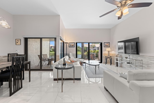 5255 Monterey Cir Unit G, Delray Beach, FL 33484 - living room with a high ceiling, light marble finish flooring, and ceiling fan