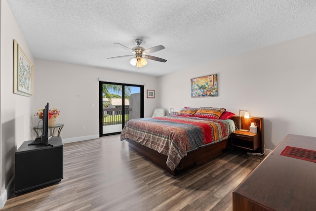 5255 Monterey Cir Unit G, Delray Beach, FL 33484 - bedroom featuring access to outside, wood finished floors, a textured ceiling, baseboards, and a ceiling fan