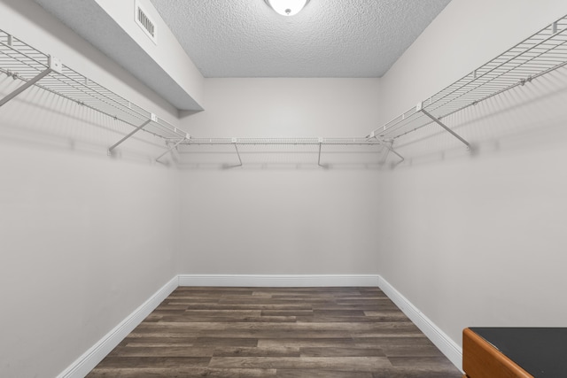 5255 Monterey Cir Unit G, Delray Beach, FL 33484 - walk in closet featuring dark wood-type flooring