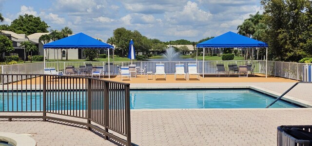 5255 Monterey Cir Unit G, Delray Beach, FL 33484 - community pool featuring a patio area and a gazebo