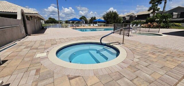 5255 Monterey Cir Unit G, Delray Beach, FL 33484 - community pool with a hot tub and a patio