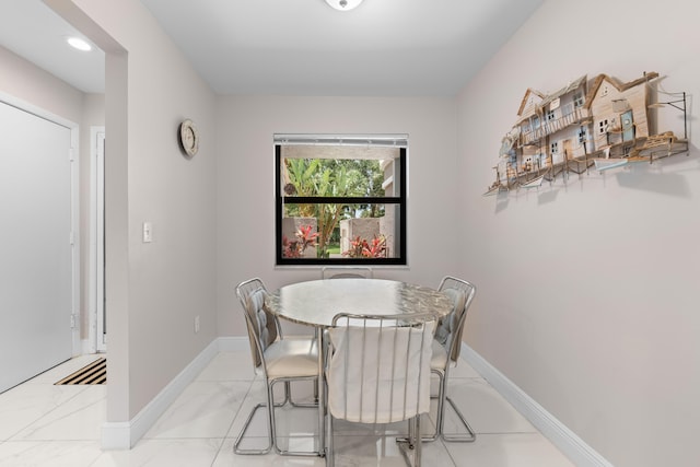5255 Monterey Cir Unit G, Delray Beach, FL 33484 - dining space with light marble finish flooring, baseboards, and recessed lighting