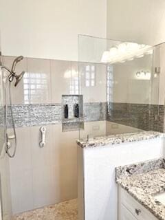 344 NW Stratford Ln, Port Saint Lucie, FL 34983 - bathroom featuring walk in shower and vanity