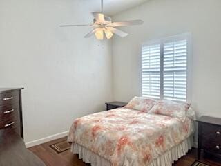 344 NW Stratford Ln, Port Saint Lucie, FL 34983 - bedroom featuring dark wood-style flooring, baseboards, and ceiling fan