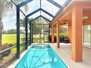 344 NW Stratford Ln, Port Saint Lucie, FL 34983 - outdoor pool with a lanai and a patio