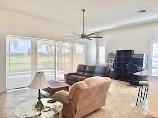 344 NW Stratford Ln, Port Saint Lucie, FL 34983 - living area featuring a ceiling fan and baseboards