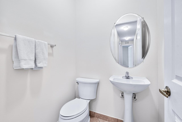1415 SE Legacy Cove Cir, Stuart, FL 34997 - half bathroom with toilet and tile patterned flooring