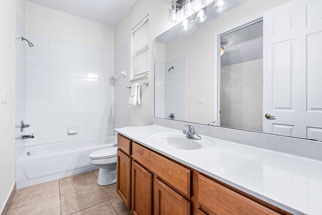 1415 SE Legacy Cove Cir, Stuart, FL 34997 - full bath featuring vanity, washtub / shower combination, and tile patterned floors