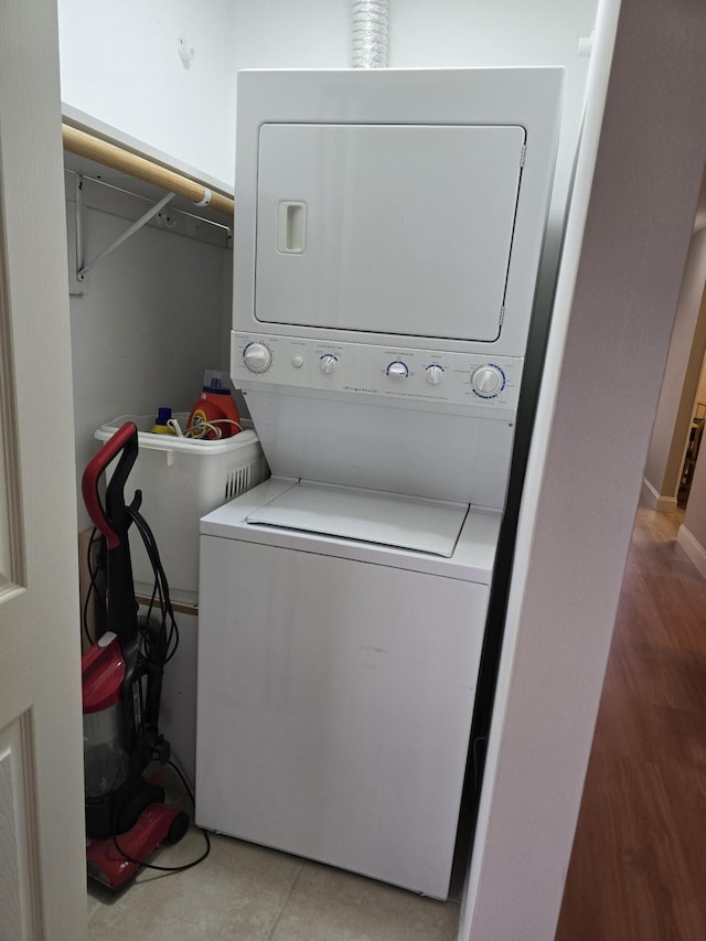 143 Lake Barbara Dr, West Palm Beach, FL 33411 - washroom with stacked washing machine and dryer