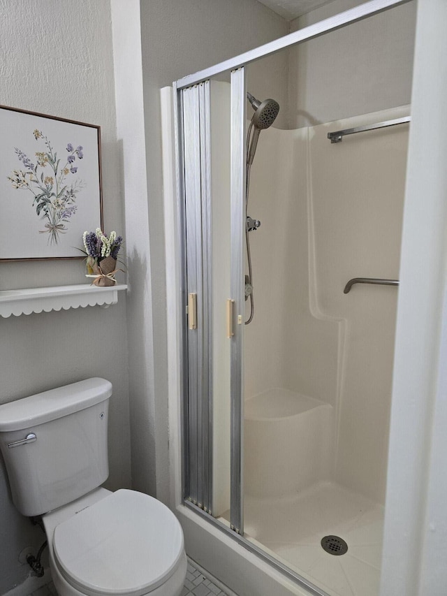 143 Lake Barbara Dr, West Palm Beach, FL 33411 - full bathroom with a shower stall and toilet