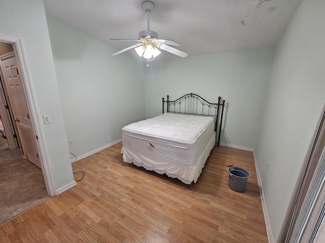 3817 SW Cheribon St, Port Saint Lucie, FL 34953 - bedroom with light wood-style flooring, baseboards, and ceiling fan