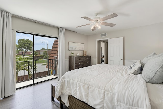 3900 County Line Rd Unit 4C, Tequesta, FL 33469 - bedroom featuring access to exterior, wood finished floors, and a ceiling fan