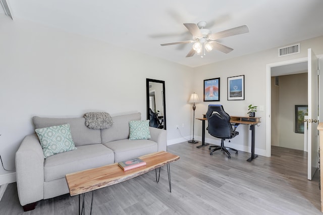 3900 County Line Rd Unit 4C, Tequesta, FL 33469 - office with a ceiling fan, light wood-style floors, and baseboards