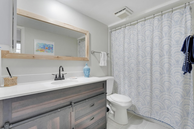 3900 County Line Rd Unit 4C, Tequesta, FL 33469 - full bath with vanity, toilet, tile patterned flooring, and a shower with shower curtain