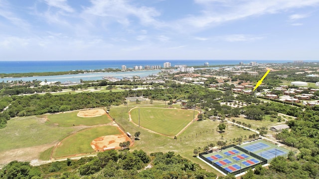 3900 County Line Rd Unit 4C, Tequesta, FL 33469 - aerial view of property and surrounding area featuring a large body of water and a tree filled landscape