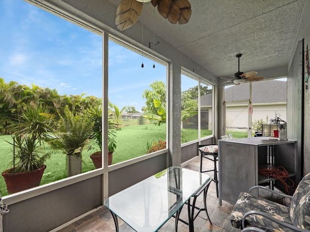 1081 SW Jacqueline Ave, Port Saint Lucie, FL 34953 - sunroom / solarium featuring a ceiling fan