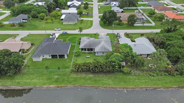 1081 SW Jacqueline Ave, Port Saint Lucie, FL 34953 - aerial view of property's location with nearby suburban area and a large body of water