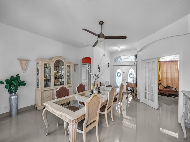 1081 SW Jacqueline Ave, Port Saint Lucie, FL 34953 - dining area featuring arched walkways, ceiling fan, and french doors