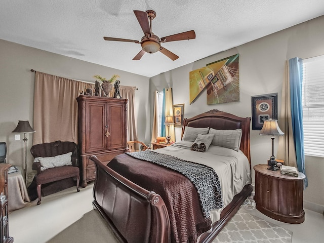1081 SW Jacqueline Ave, Port Saint Lucie, FL 34953 - bedroom with ceiling fan and a textured ceiling