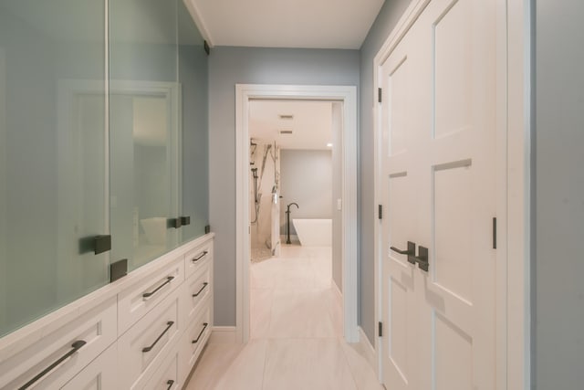 438 River Edge Rd, Jupiter, FL 33477 - corridor featuring light tile patterned flooring and baseboards
